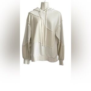 NWT - RARE/SELF All-Gender
Pieced Terry Knit Oversized
Hoodie Color: White
Cream